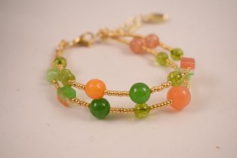 Alternative view of Bracciale Gaia arancione, verde e dorato